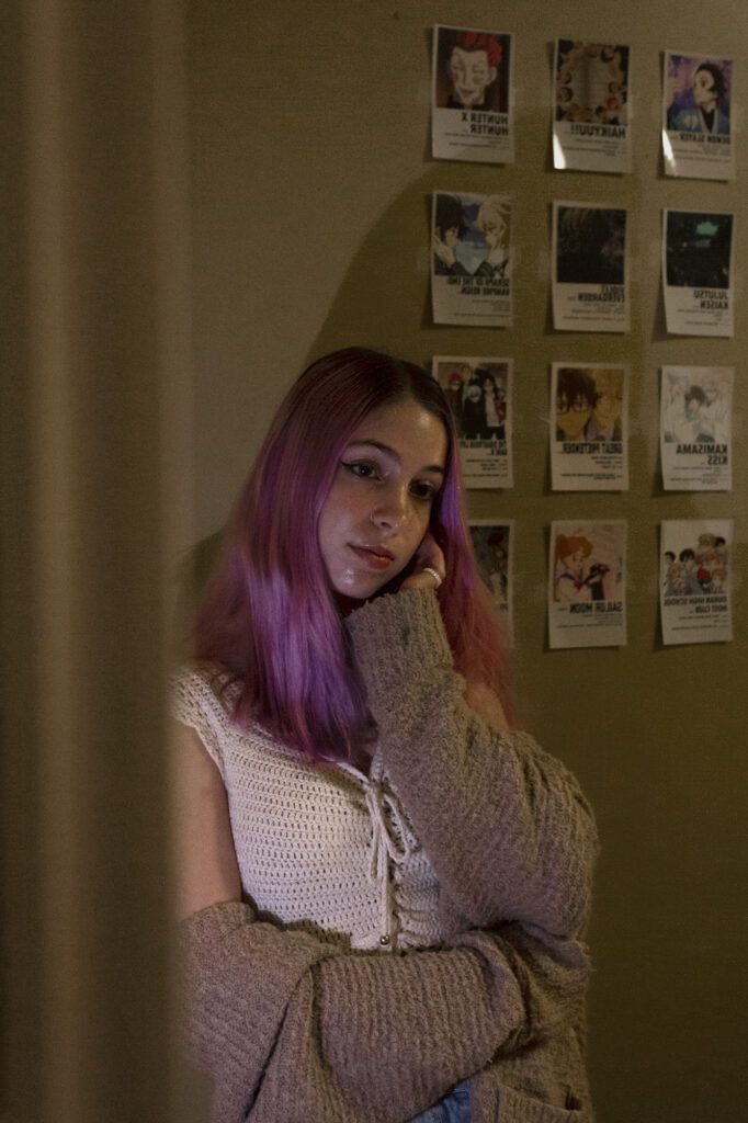 Natalie looking in mirror