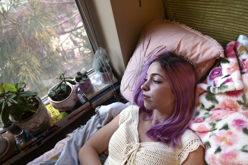 Natalie staring out the window